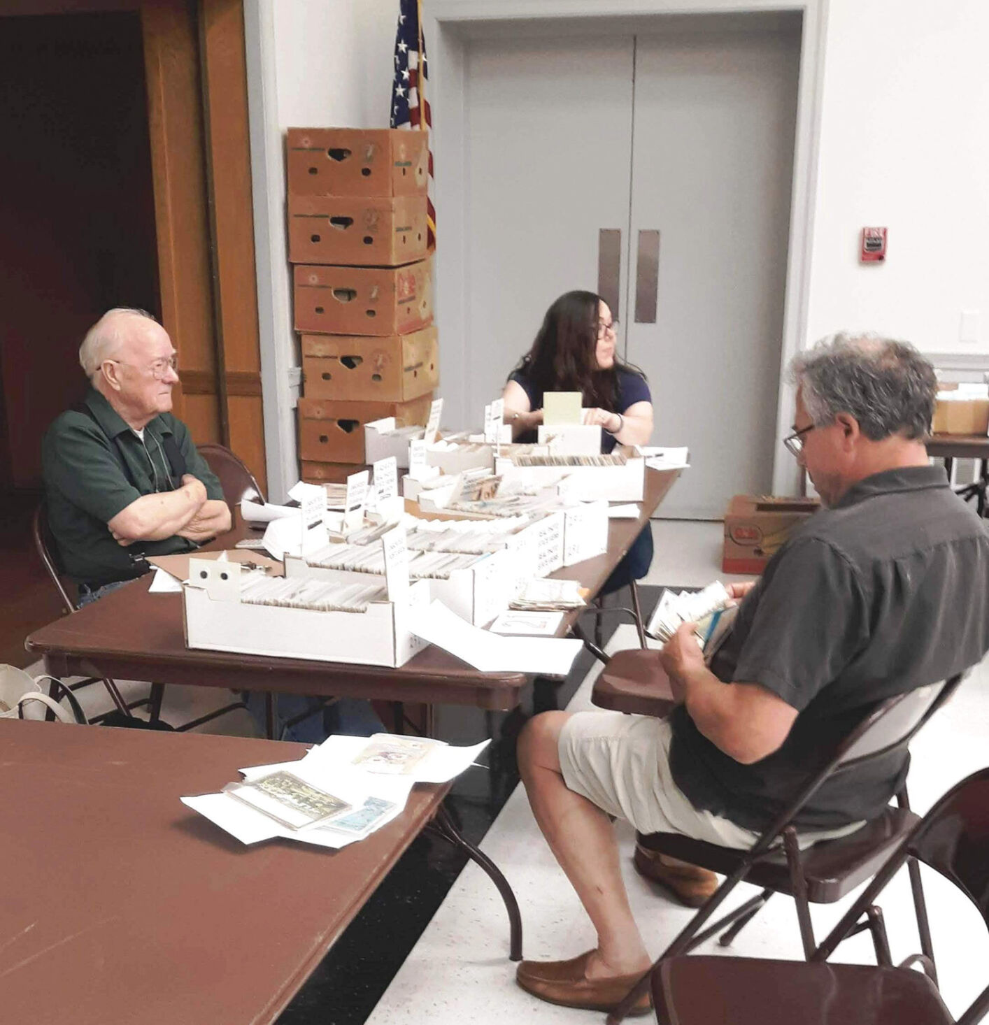 Collectors Examining Cards During Meeting (1).jpg